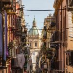 View at the church of San Matteo located in heart of Palermo, Italy, Europe. Traditional Italian medieval city center with typical narrow residential street.